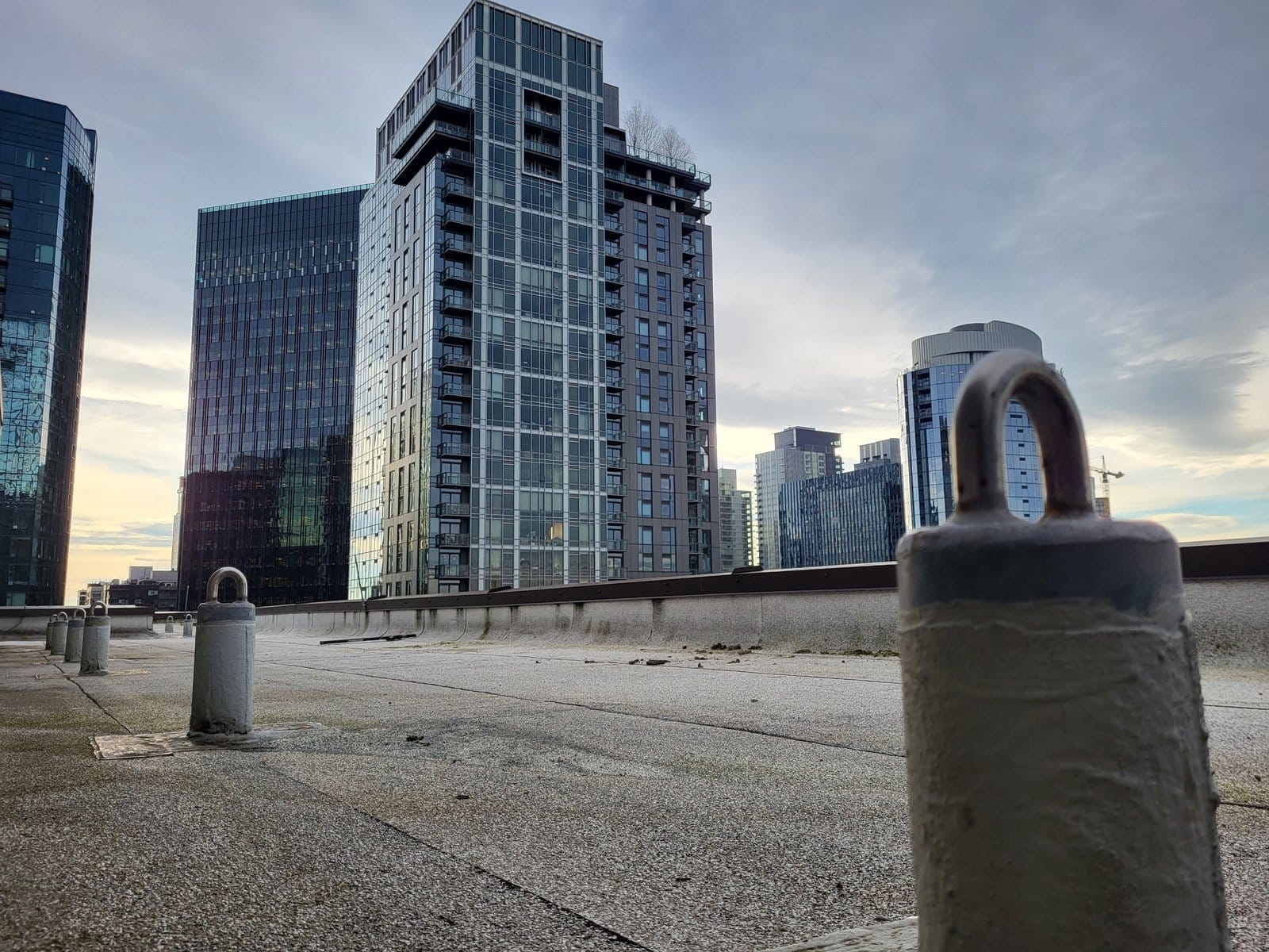 Rooftop anchor system with city skyline