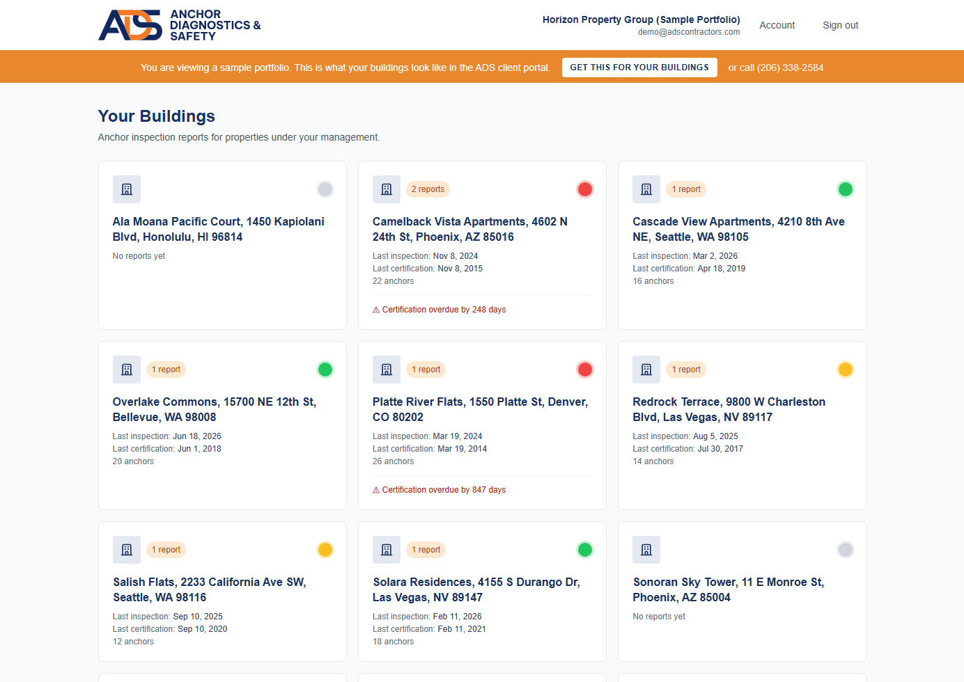 ADS Client Portal dashboard showing a portfolio of buildings with compliance status lights